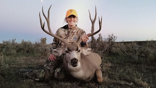 Cindi Baudhuin is all smiles with a tremendous public land buck shot in her home state of Wyoming.